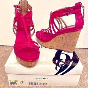 Hot pink high wedge Nine West sandals. Zipper back ankle closed bank.
